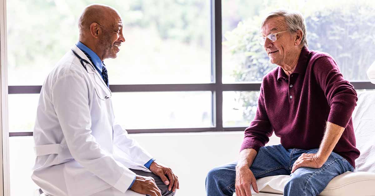 Doctor talking to patient