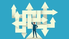 Businessperson on a crossroad