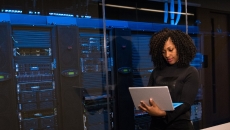 Cybersecurity professional in server room