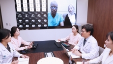 A clinical team at Asan Medical Center in a virtual call with a patient overseas
