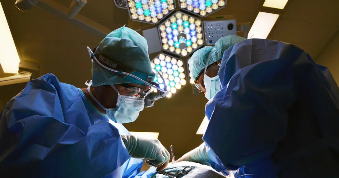 Two surgeons operating